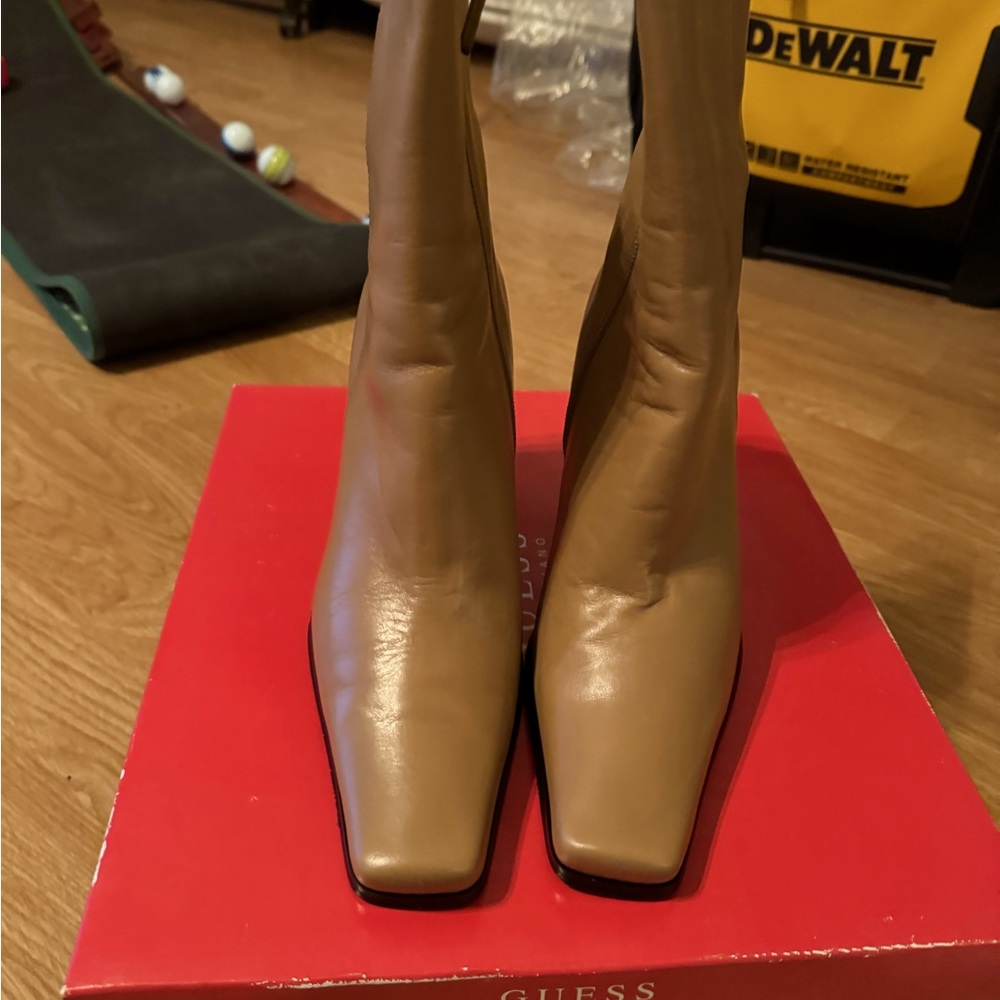 Guess brand new ankle healed boots size 8 camel color.